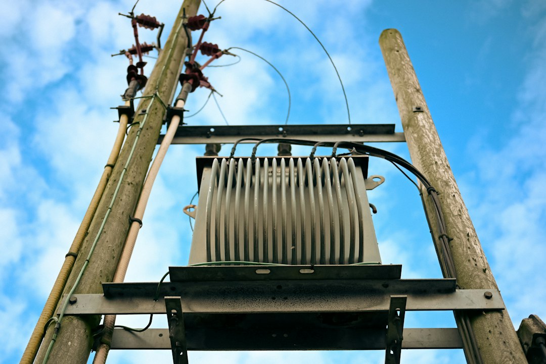 Electrical substation with a power transformer and distribution structures illustrating the grid infrastructure serving large industrial electrical loads.